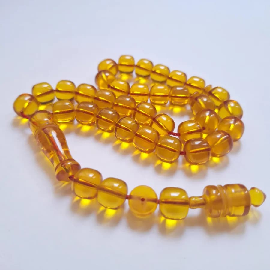 تسبیح سندلوس 33 دانه بودار تراش استوانه‌ای خوشرنگ قپاندار شماره 11 کد 1391 آقابزرگ — تصویر ۲