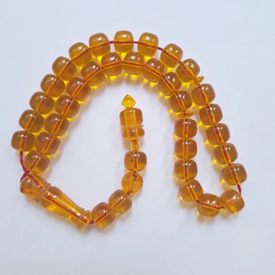 تسبیح سندلوس 33 دانه بودار تراش استوانه‌ای خوشرنگ قپاندار شماره 11 کد 1391 آقابزرگ — تصویر ۴