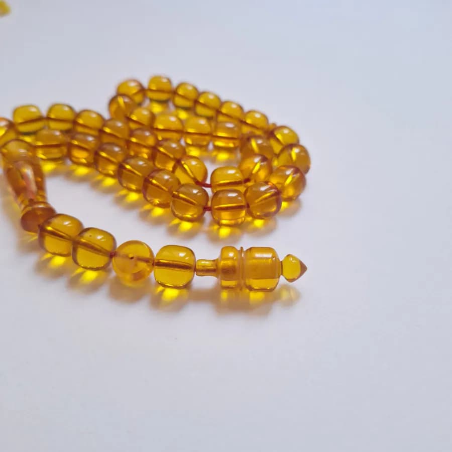 تسبیح سندلوس 33 دانه بودار تراش استوانه‌ای خوشرنگ قپاندار شماره 11 کد 1391 آقابزرگ — تصویر ۵