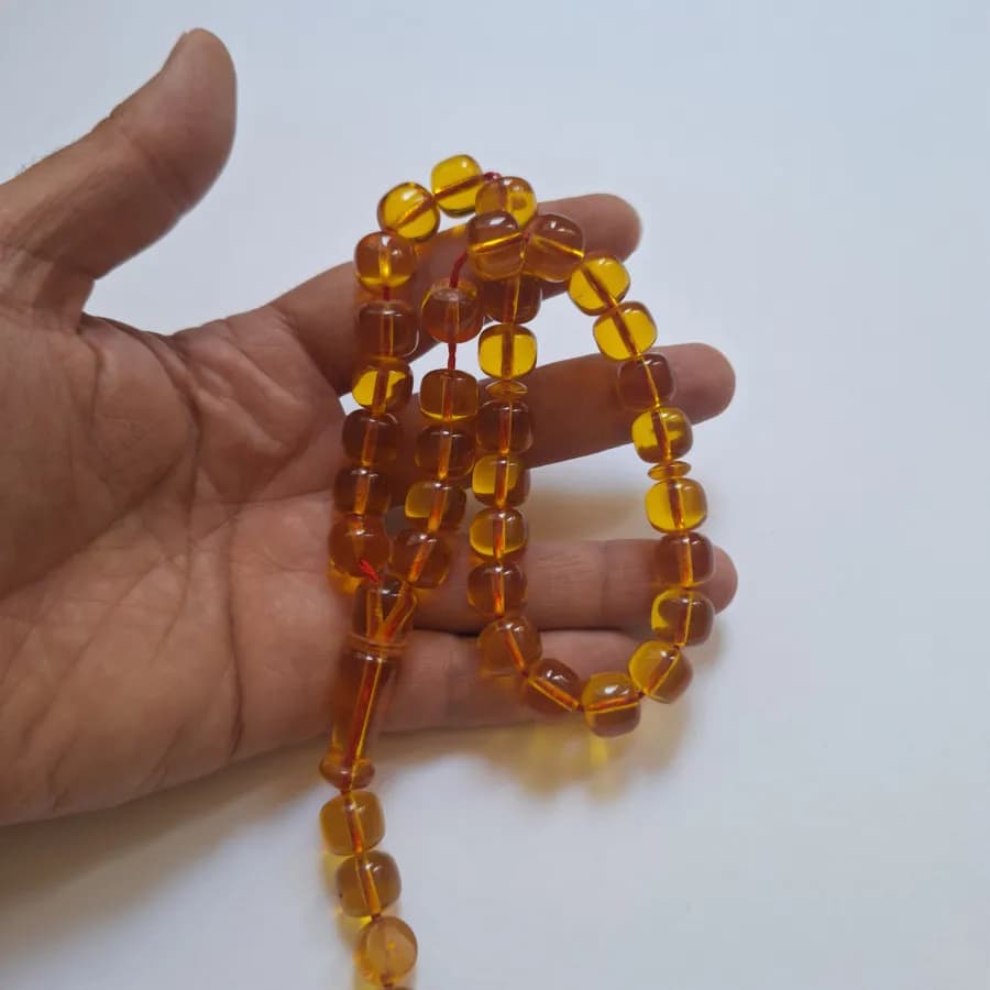 تسبیح سندلوس 33 دانه بودار تراش استوانه‌ای خوشرنگ قپاندار شماره 11 کد 1391 آقابزرگ — تصویر ۷