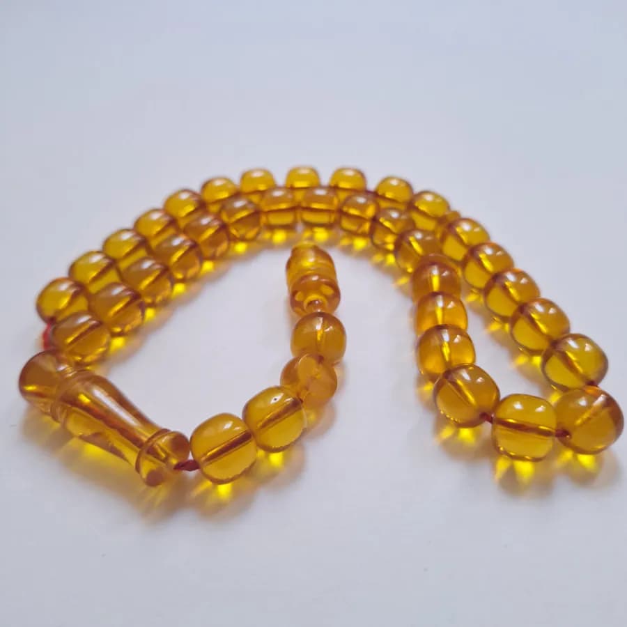 تسبیح سندلوس 33 دانه بودار تراش استوانه‌ای خوشرنگ قپاندار شماره 11 کد 1391 آقابزرگ — تصویر ۸