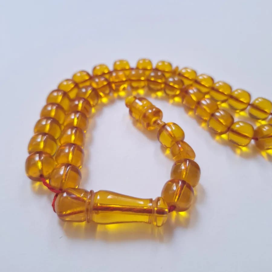 تسبیح سندلوس 33 دانه بودار تراش استوانه‌ای خوشرنگ قپاندار شماره 11 کد 1391 آقابزرگ — تصویر ۹