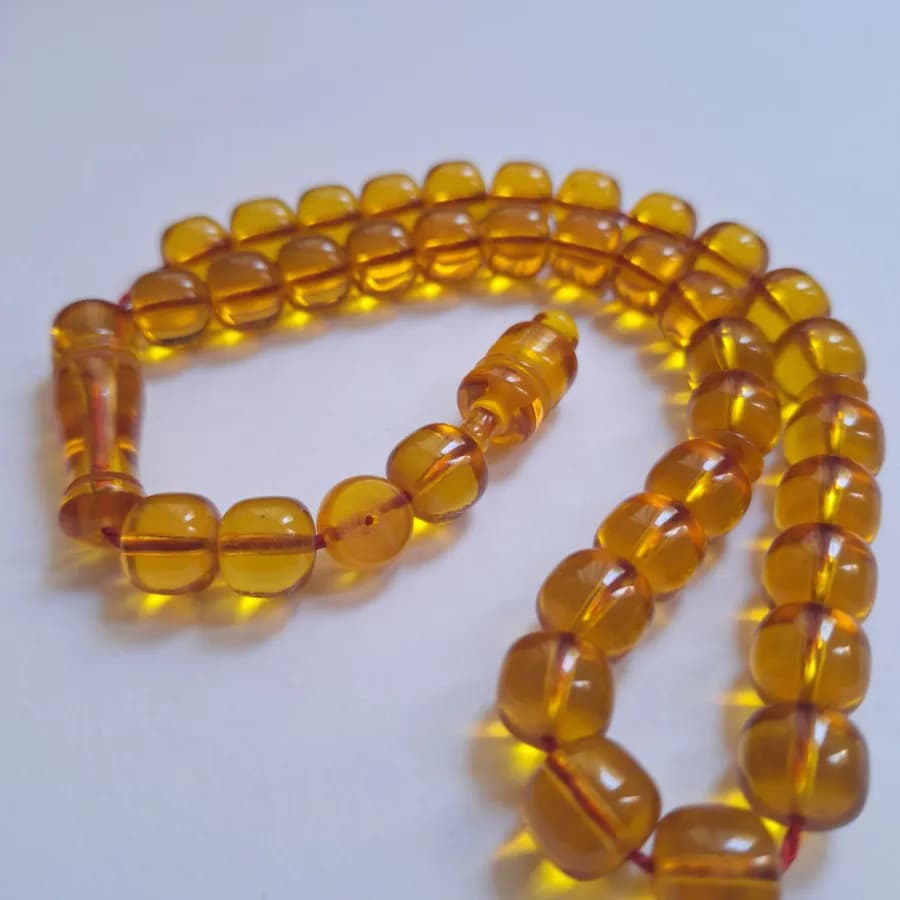 تسبیح سندلوس 33 دانه بودار تراش استوانه‌ای خوشرنگ قپاندار شماره 11 کد 1391 آقابزرگ — تصویر ۱۱