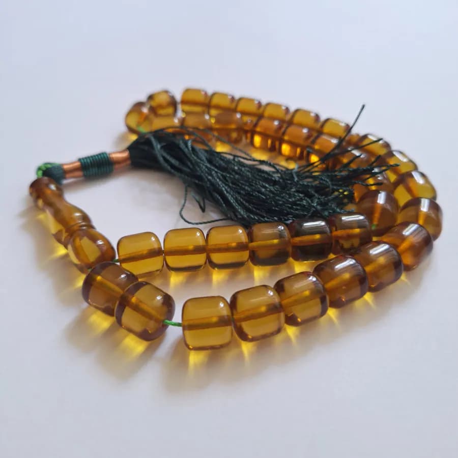 تسبیح سندلوس عسلی بودار 35 دانه اصل کد 1351 استوانه‌ای بسیار خوشرنگ آقابزرگ — تصویر ۵
