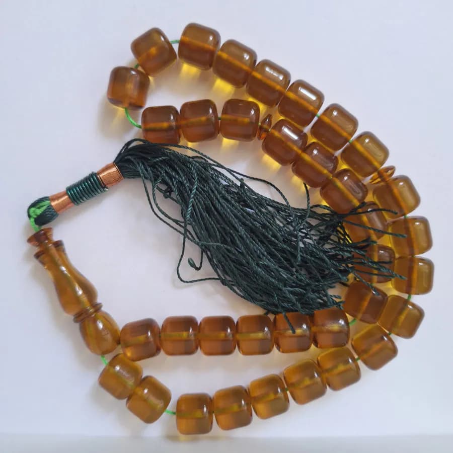 تسبیح سندلوس عسلی بودار 35 دانه اصل کد 1351 استوانه‌ای بسیار خوشرنگ آقابزرگ — تصویر ۸