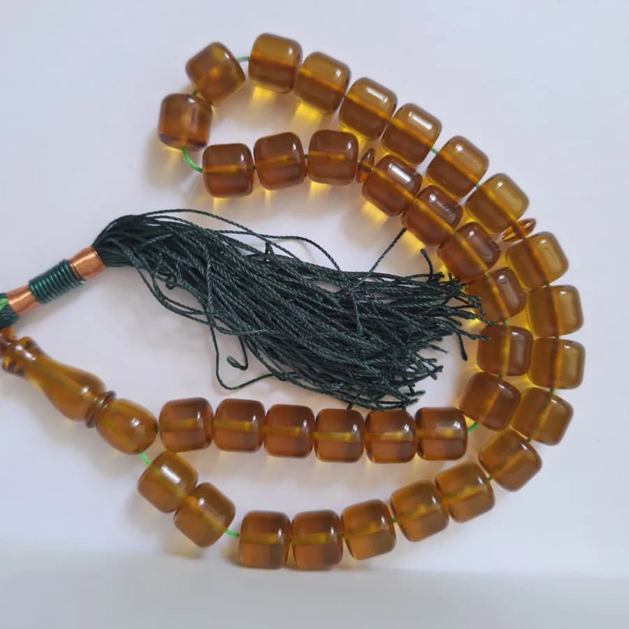 تسبیح سندلوس عسلی بودار 35 دانه اصل کد 1351 استوانه‌ای بسیار خوشرنگ آقابزرگ — تصویر ۹