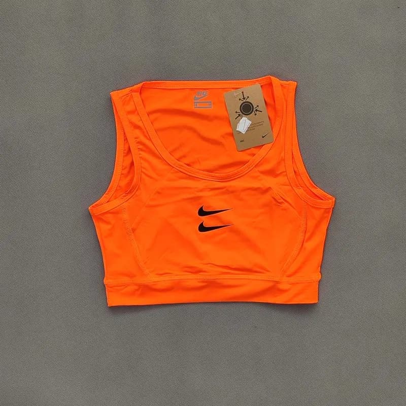 نیم تنه ورزشی نایک مدل Dri-FIT زنانه — تصویر ۳