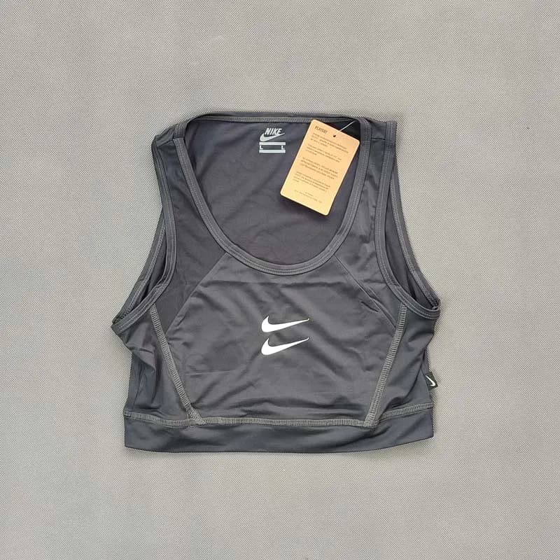 نیم تنه ورزشی نایک مدل Dri-FIT زنانه — تصویر ۴