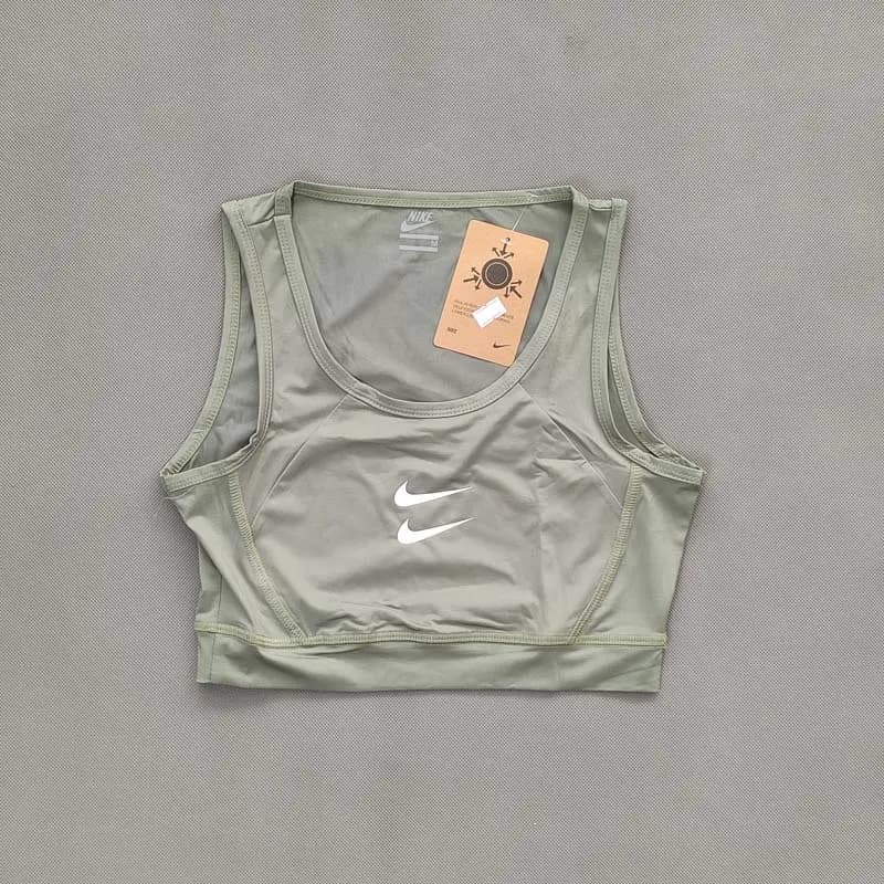 نیم تنه ورزشی نایک مدل Dri-FIT زنانه — تصویر ۵