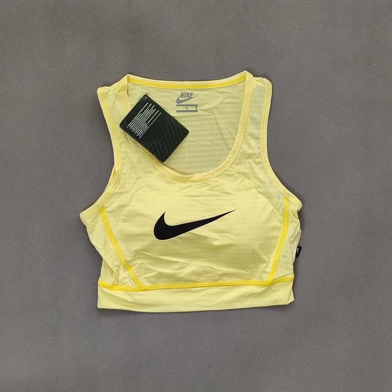 نیم تنه ورزشی نایک مدل Dri-FIT زنانه – کاپ دار و تنفسی — تصویر ۳