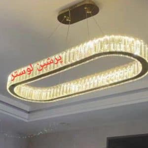 لوستر مدرن آویز تک حلقه بیضی با کریستال بلند 7 سانتی(2 سال ضمانت)