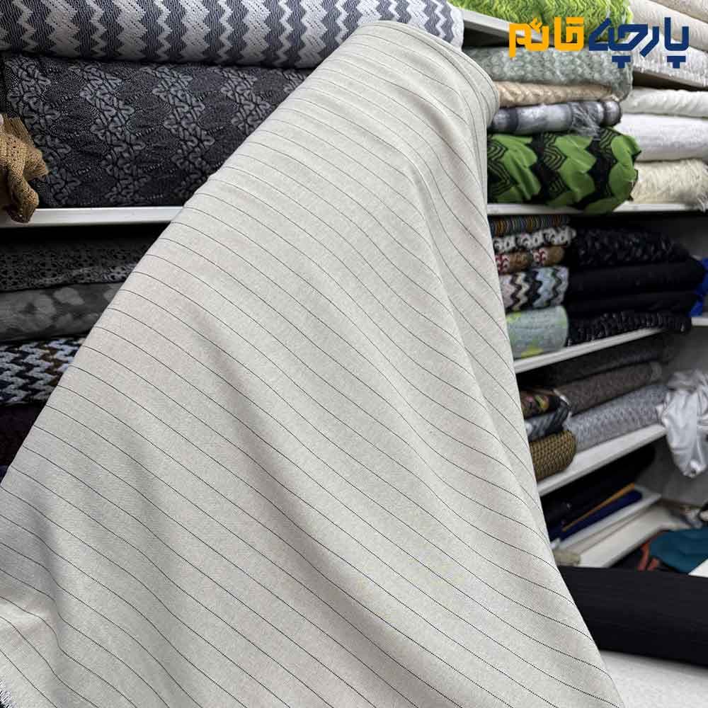 پارچه پاییزه زمستانه لینن پاییزه دیپلمات رنگ کرم روشن خط مشکی عرض ۱۵۰ کد 13836