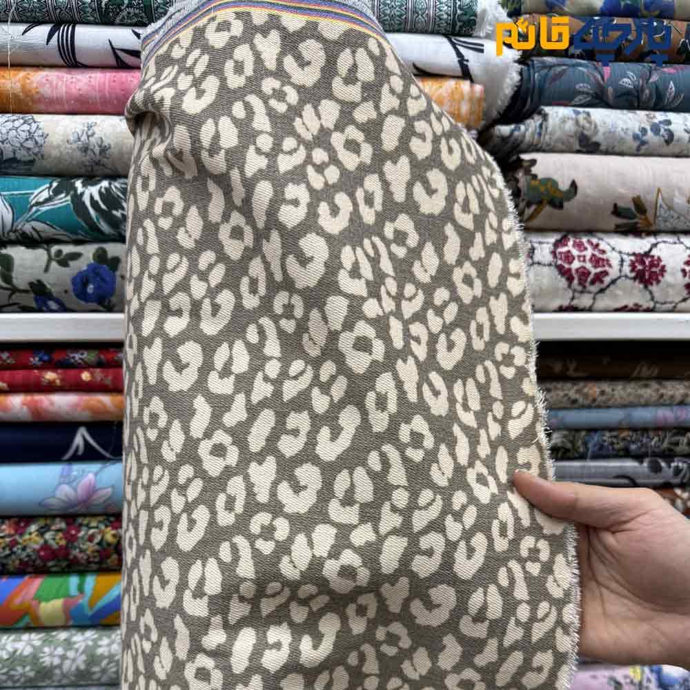 جین طرحدار سنگشور طرح خاص سفید (آفوایت)طرح سبز زیتونی پلنگی عرض ۱۵۰ کد 12520