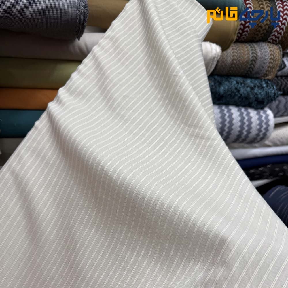 پارچه لینن طرحدار طرح از خود راه راه رنگ کرم خاص متوسط عرض 150 کد12328
