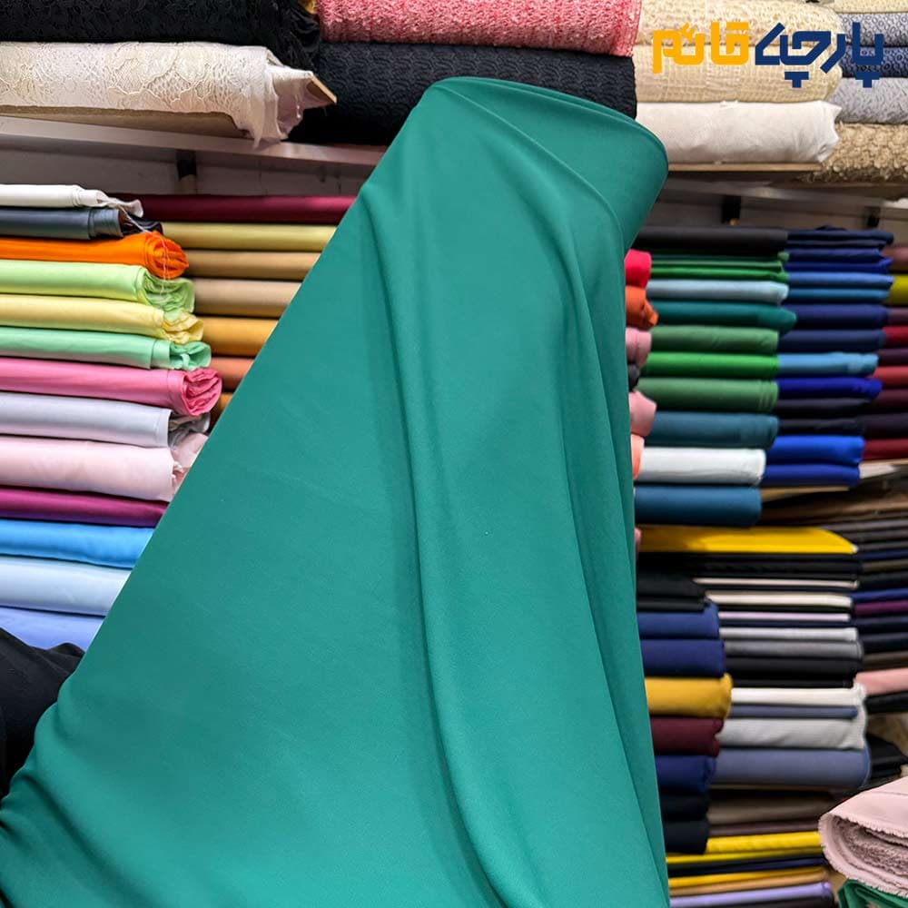 پارچه مجلسی کرپ ساده اندونزی رنگ سبز متوسط(بنتون) عرض ۱۵۰ کد 11763