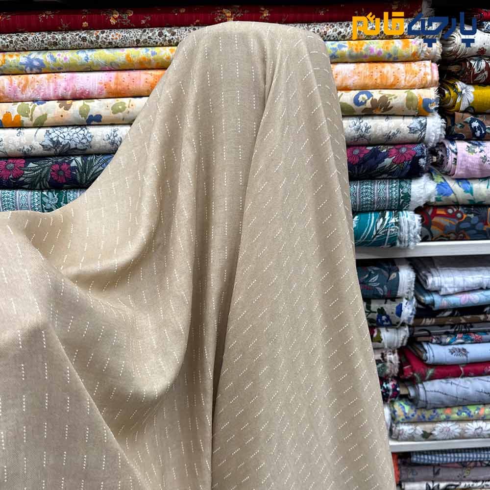 پارچه لینن طرحدار دبل فیس طرح خطی رنگ کرم روشن عرض ۱۵۰ کد 11735