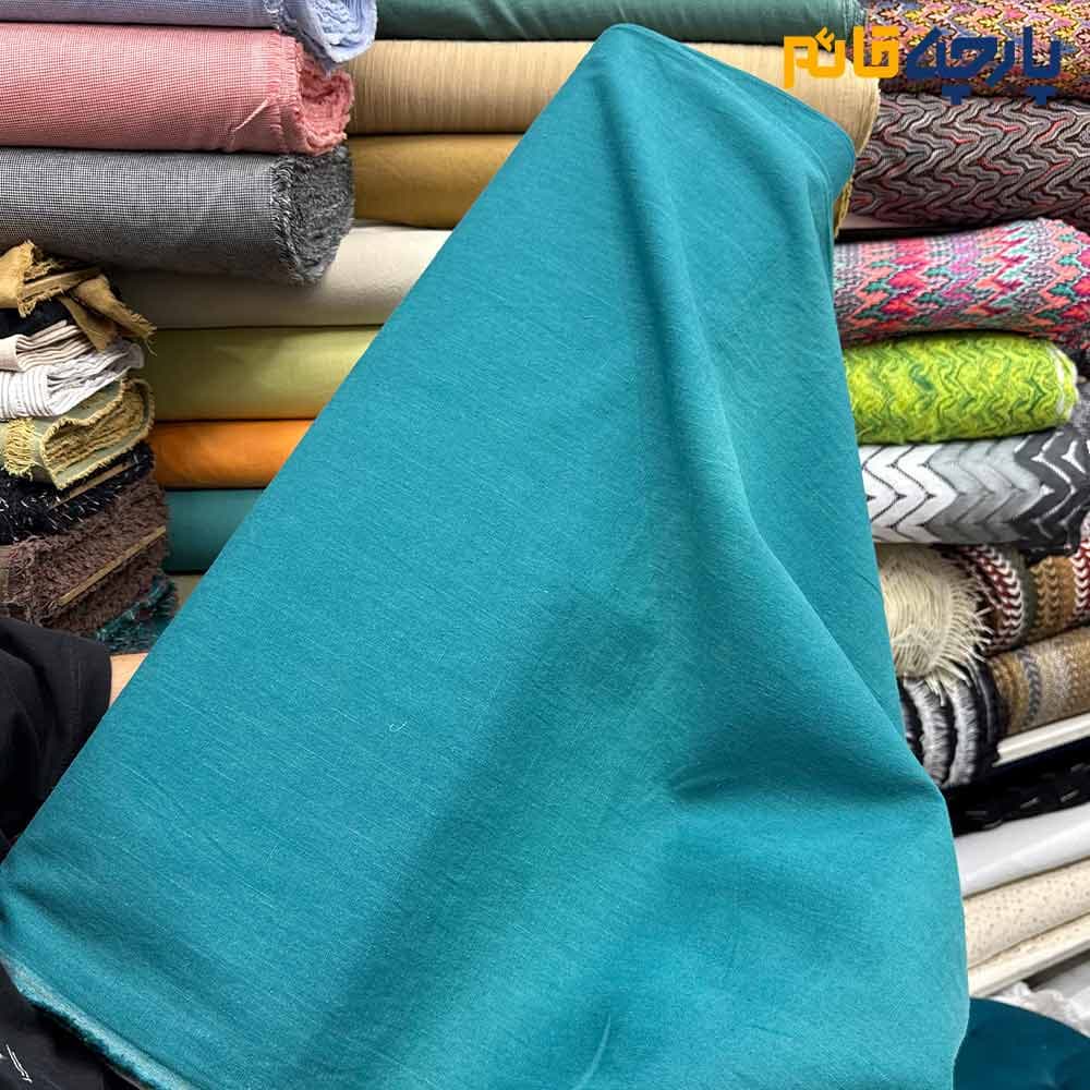 پارچه بهاره تابستانه لینن ساده رنگ سبز آبی عرض ۱۵۰ کد11353