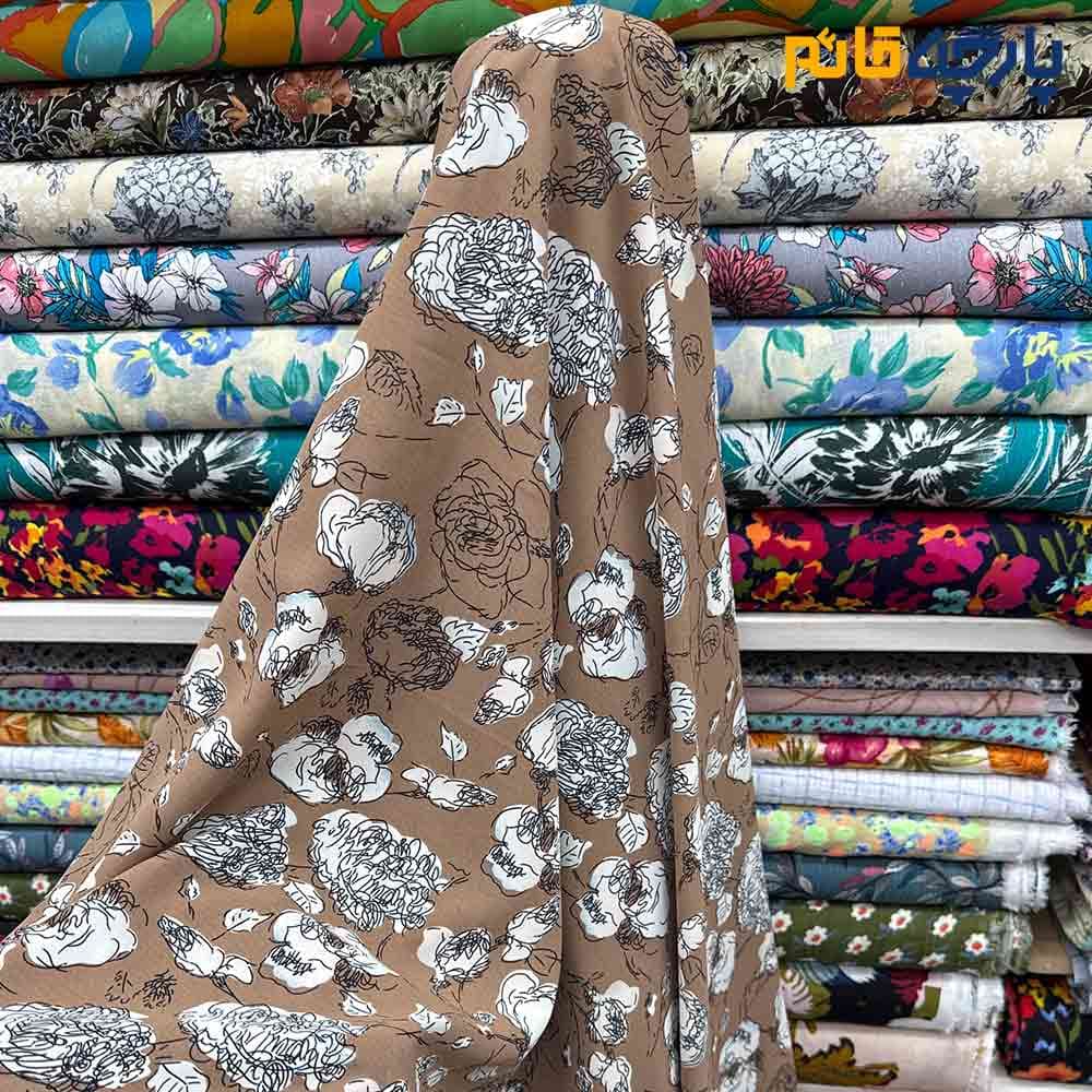 پارچه کرپ نخ طرحدار زمینه کرم کاکائویی طرح خاص کد10857