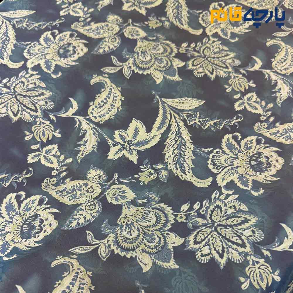 پارچه بهاره تابستانه سیلک نخ طرحدار زمینه رنگ سرمه ای طرح کرم داماس کد9919 — تصویر ۳