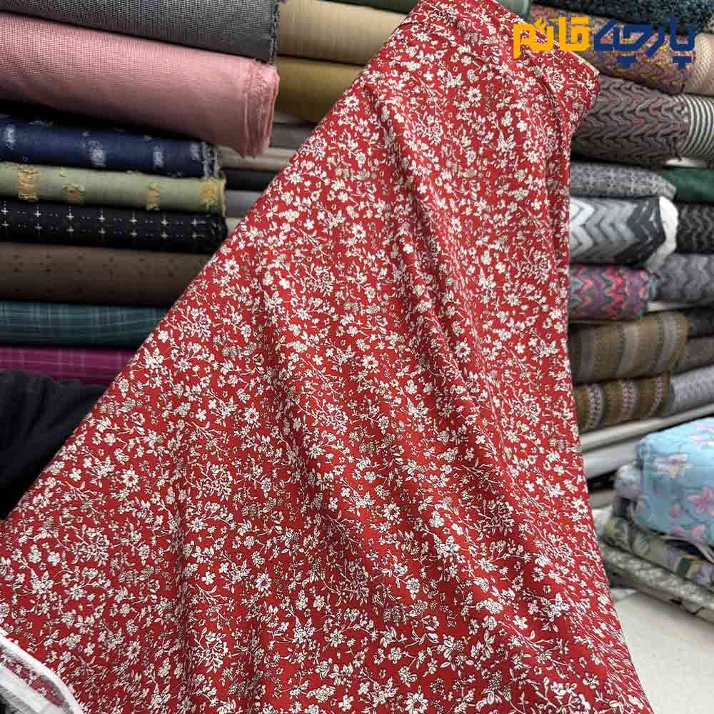 پارچه بهاره و تابستانه وال طرحدار کره زمينه قرمز طرح ريز كرم کد9567
