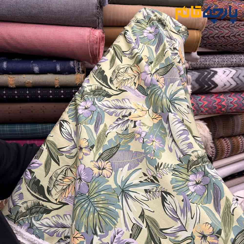 پارچه بهاره و تابستانه وال طرحدار کره طرح برگ هاوايي زمينه سبز روشن کد 9544