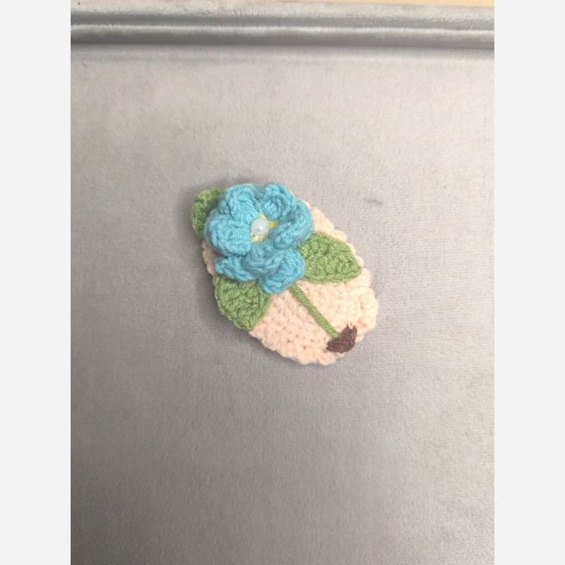 گیره مو بافتنی طرح گل آبی