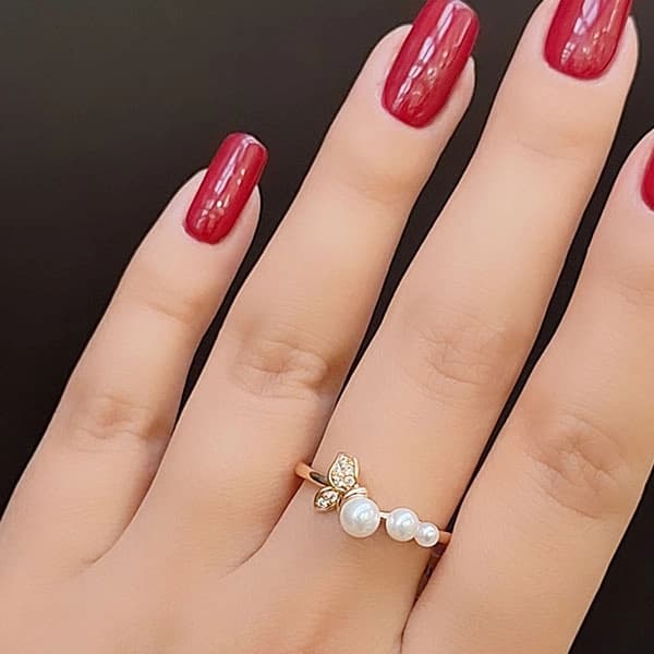 انگشتر زنانه ژوپینگ ظریف مرواریدی و نگین دار رنگ طلایی
