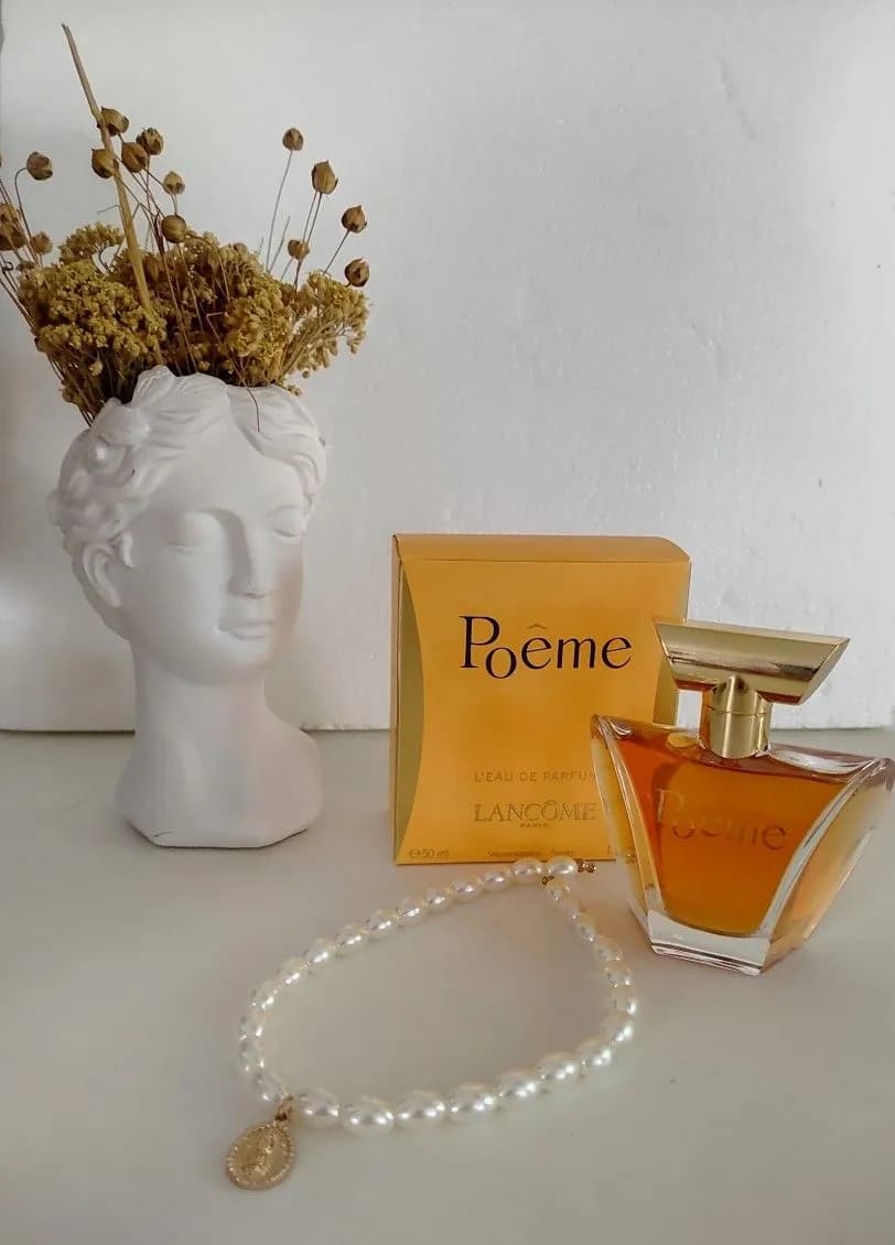 عطر ادکلن لانکوم پوئم زنانه اصل — تصویر ۸