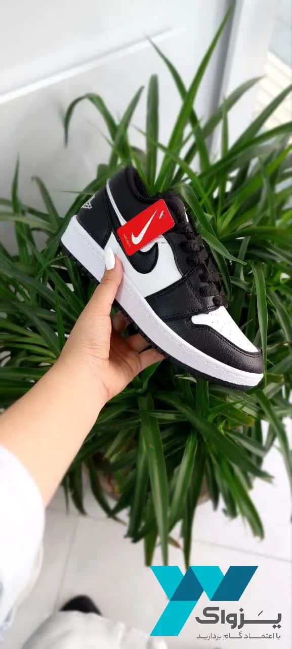 کتونی زنانه جردن وان (Jordan 1 Low) مشکی سفید — تصویر ۳