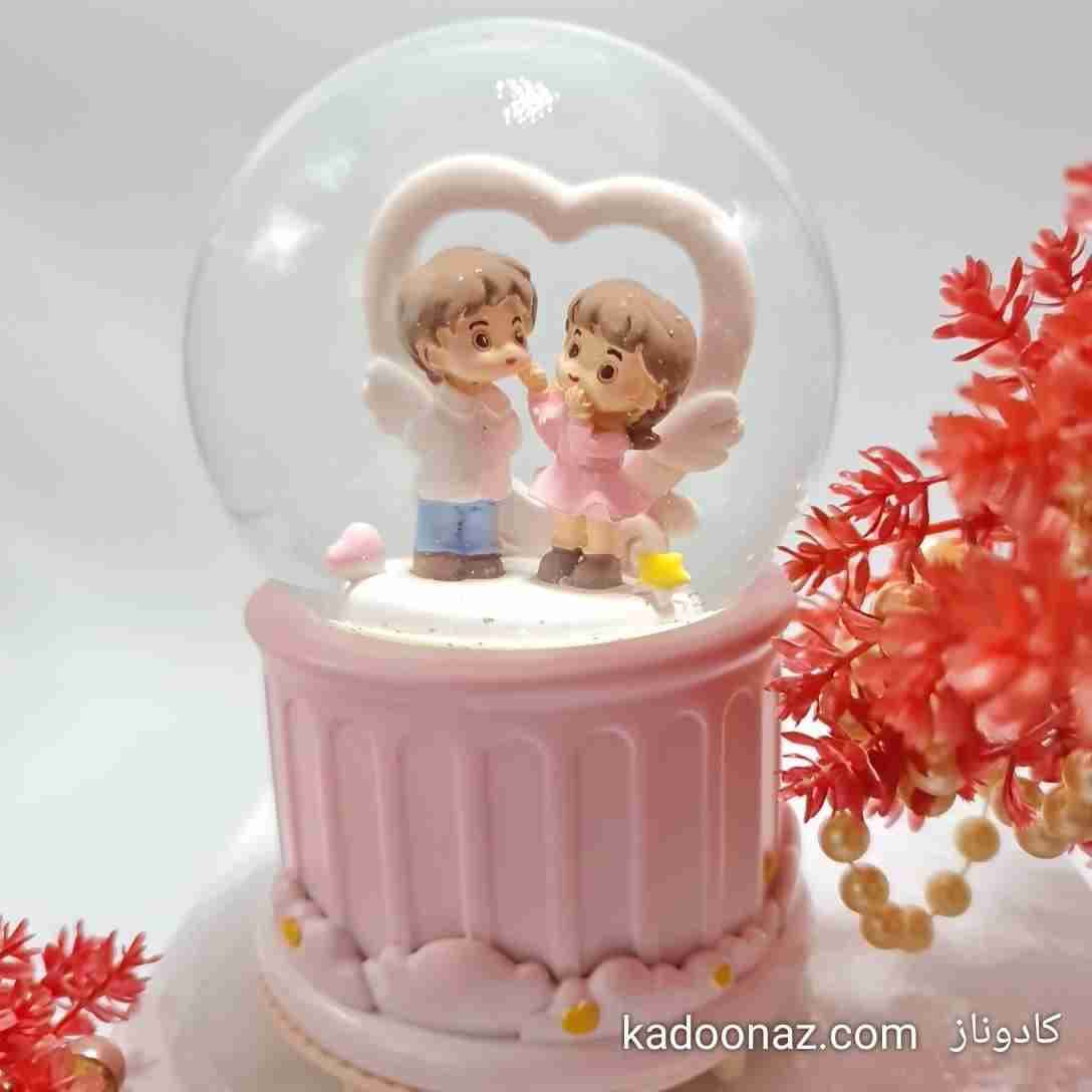 گوی شیشه ای بزرگ چرخان موزیکال عشق بیپایان — تصویر ۹