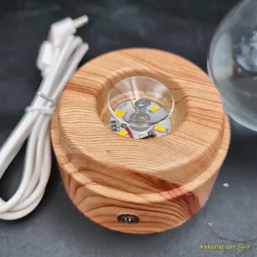 چراغ شب خواب و گوی کریستال سه بعدی بزرگ چرخان با قطر ۸ سانت با طرح دولفین و ماه — تصویر ۴