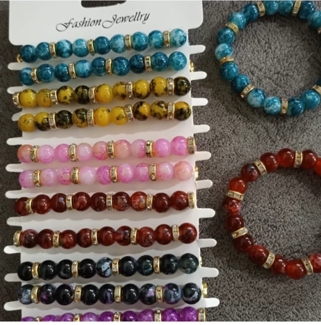 هدیه اکسسوری | دستبند آبرنگی رینگ‌دار (رنگ‌بندی رندوم)