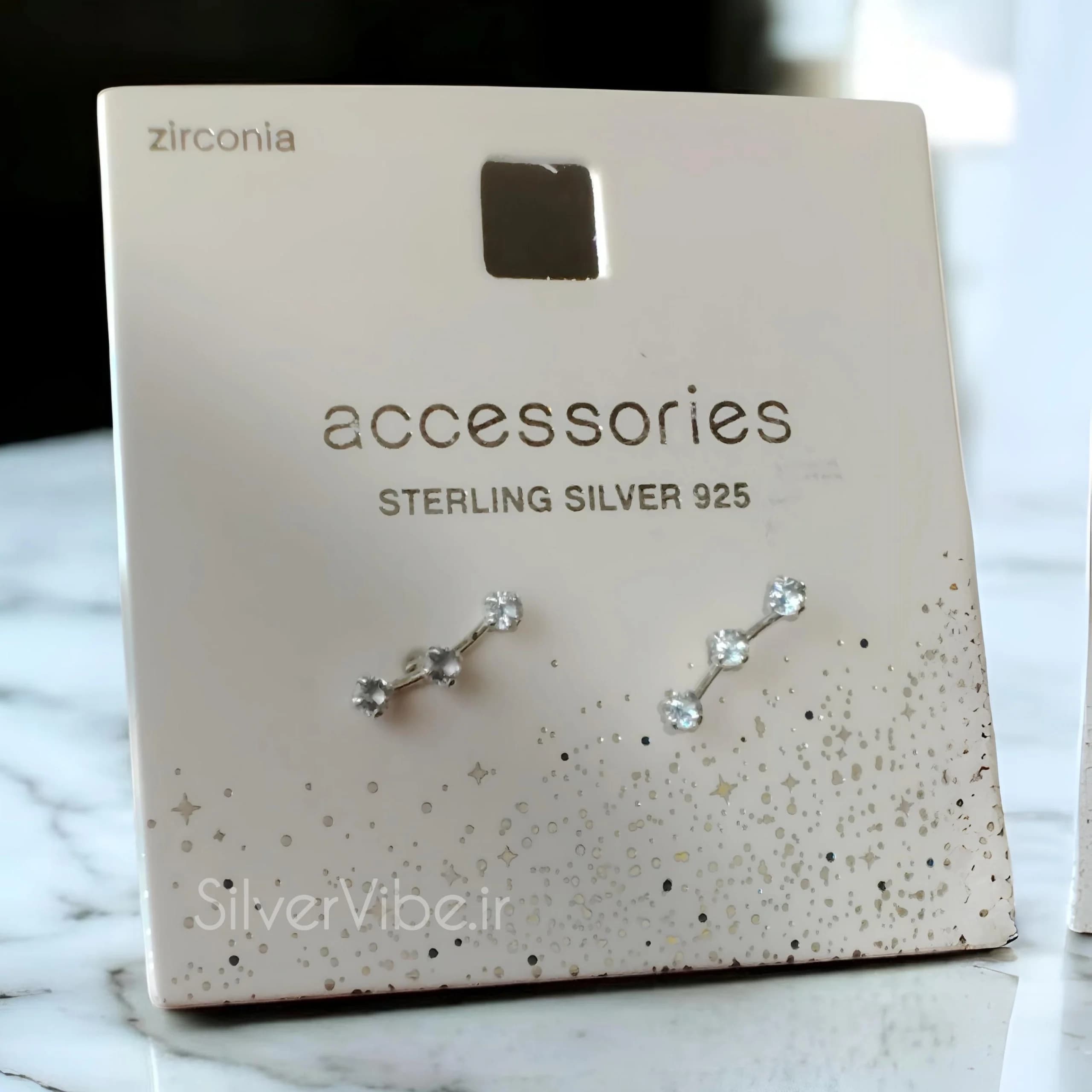 گوشواره نقره سه نگینی | نگین آبی | برند accessories — تصویر ۲