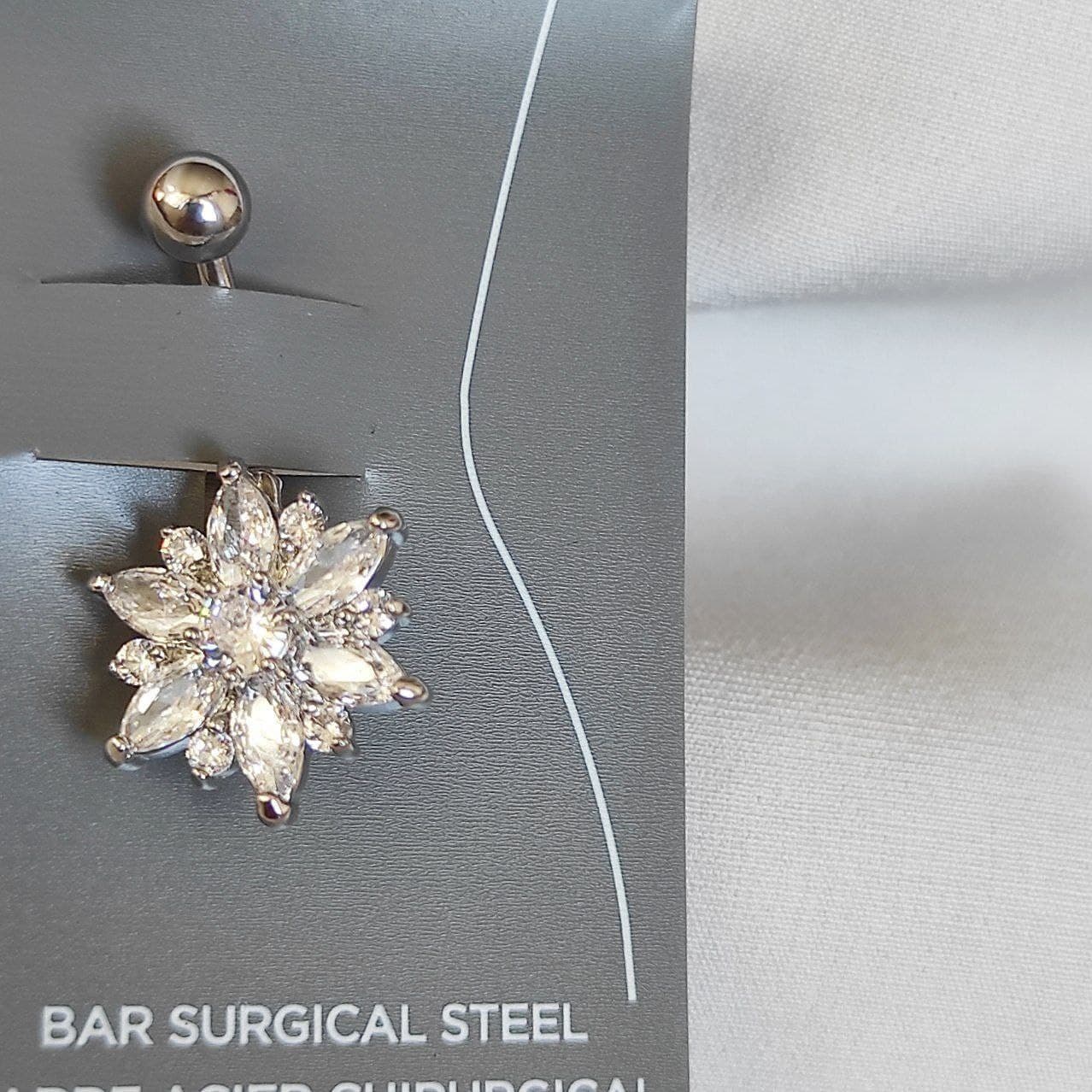 پیرسینگ ناف طرح گل پرنگین (Belly Rings) استیل درجه یک وارداتی کیفیت عالی