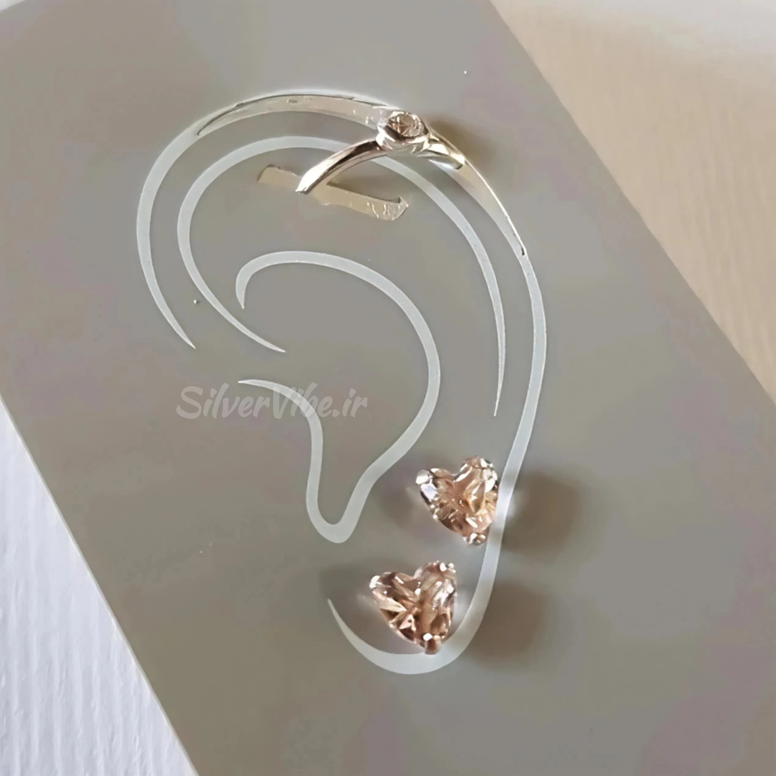 گوشواره نقره زنانه طرح قلب نگین رزگلد با پیرسینگ نگین دار – 0.85 گرم