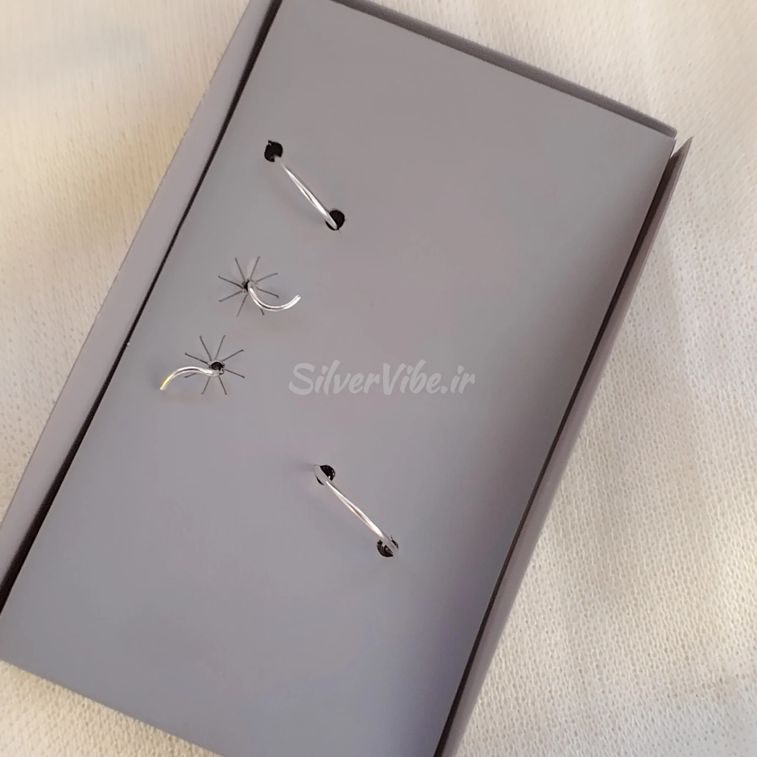 پیرسینگ بینی نقره | ست چهارتایی نگینی و حلقه ای | برند accessories — تصویر ۷