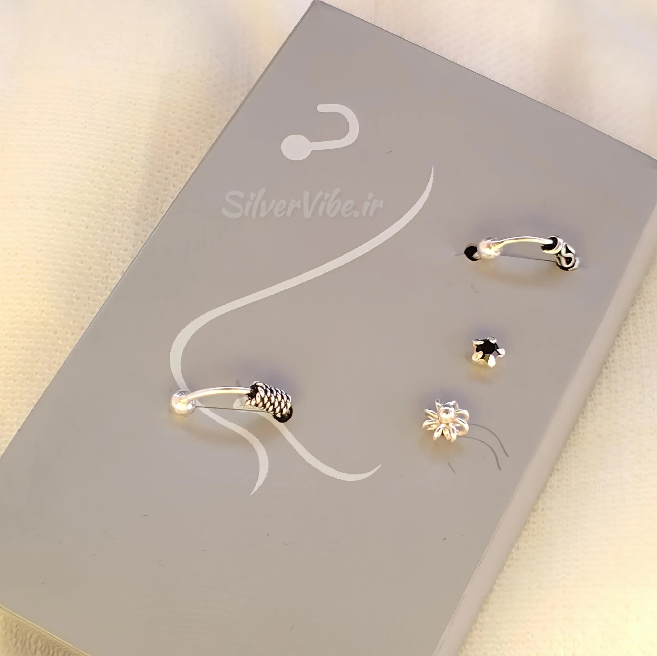 پیرسینگ بینی نقره | ست چهارتایی نگینی و حلقه ای | برند accessories — تصویر ۵