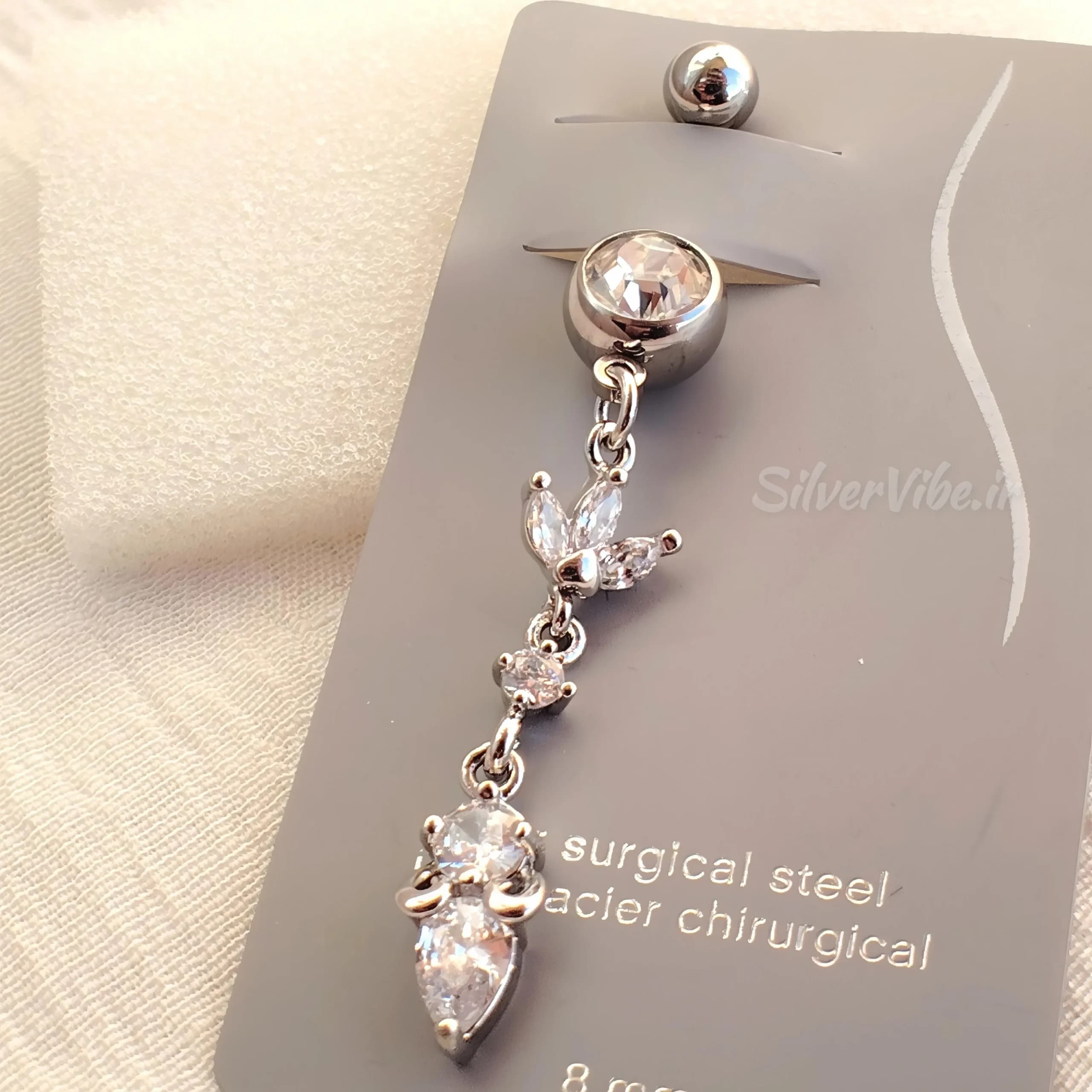پیرسینگ ناف استیل | آویز بلند طرح برگ نگین دار | برند Accessories — تصویر ۲