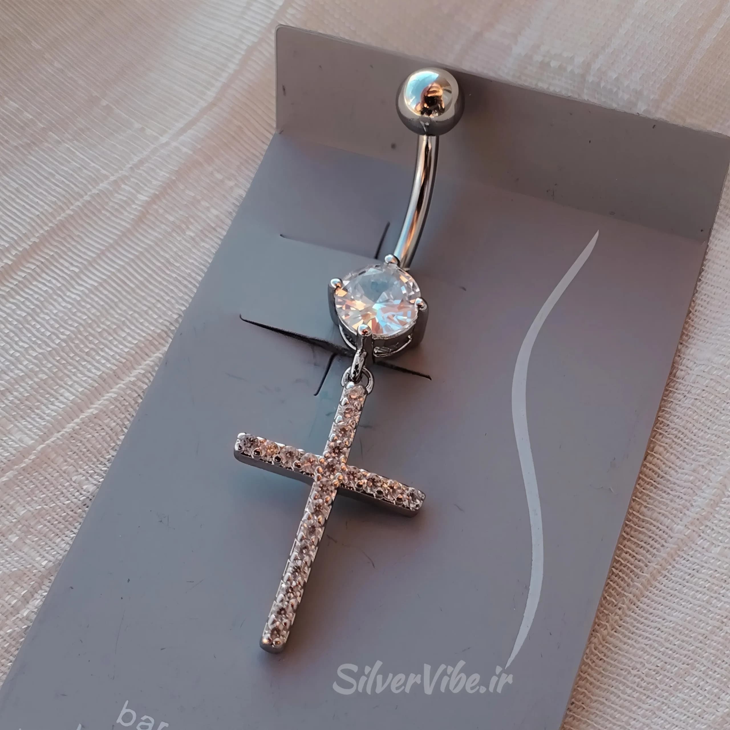 پیرسینگ ناف استیل | طرح صلیب نگین دار | برند Accessories