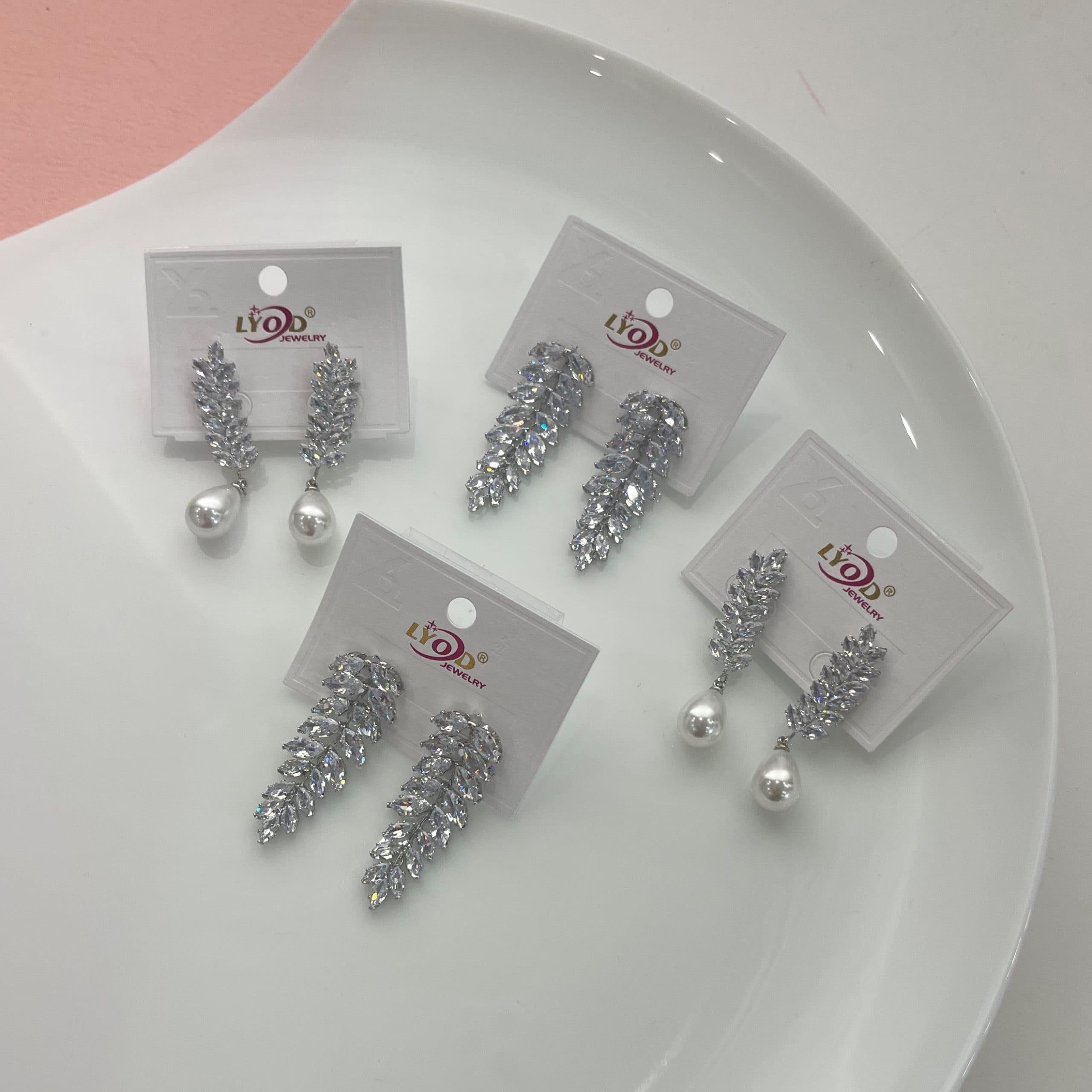 گوشواره تنیسی طرح برگ