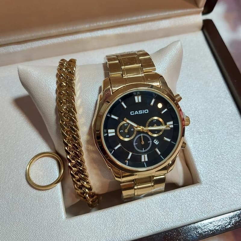 ساعت مچی مردانه کاسیو Casio طرح سه موتور طلایی همراه دستبند کارتیر و حلقه رینگ — تصویر ۲