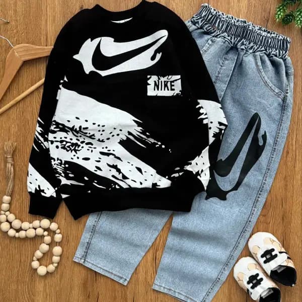 ست بلوز دورس و شلوار جین پسرانه طرح نایک Nike مشکی و آبی یخی