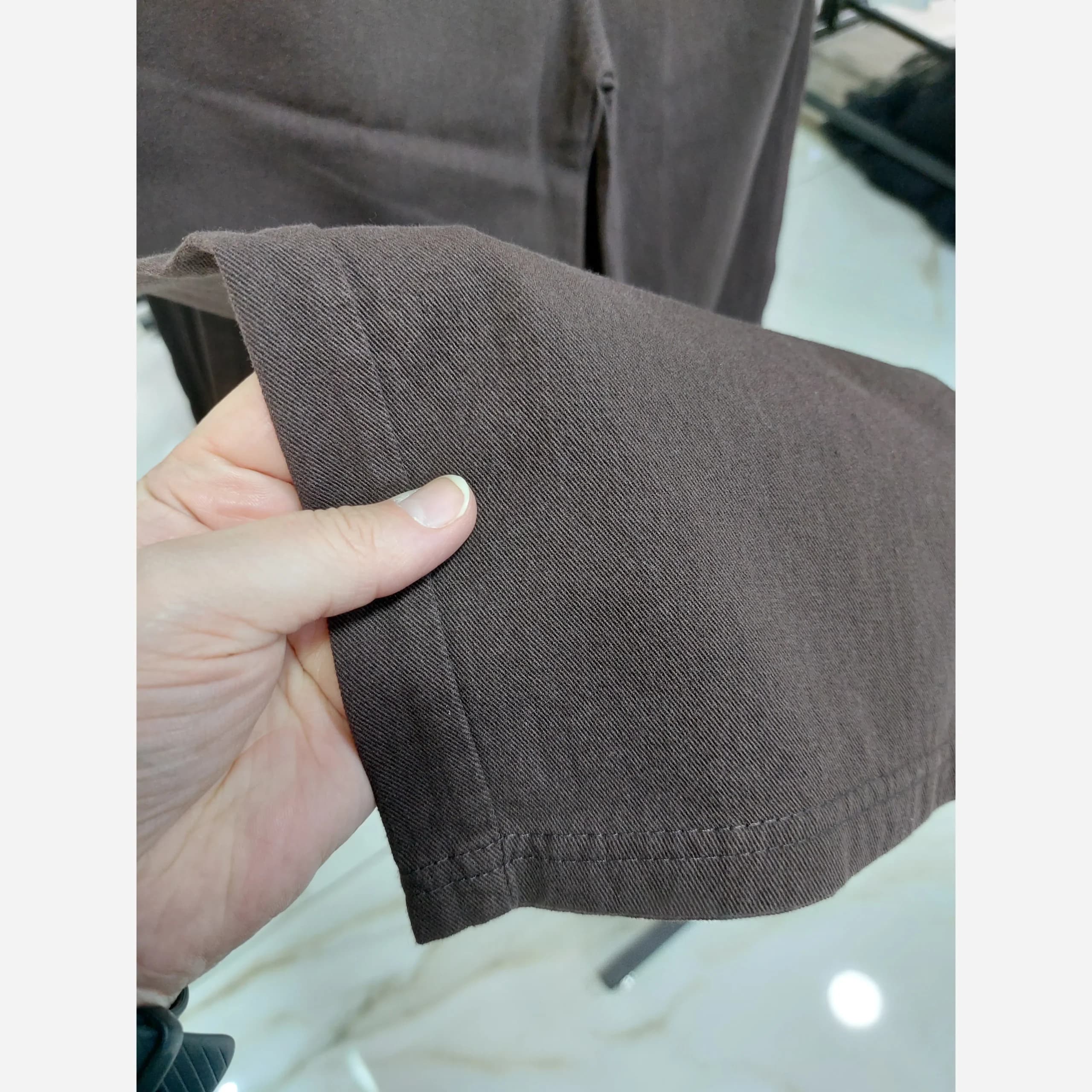 شلوار کتان نیم بگ اسپرت دخترانه و پسرانه 5 تا 11 سال رنگ قهوه ای و کرم — تصویر ۳