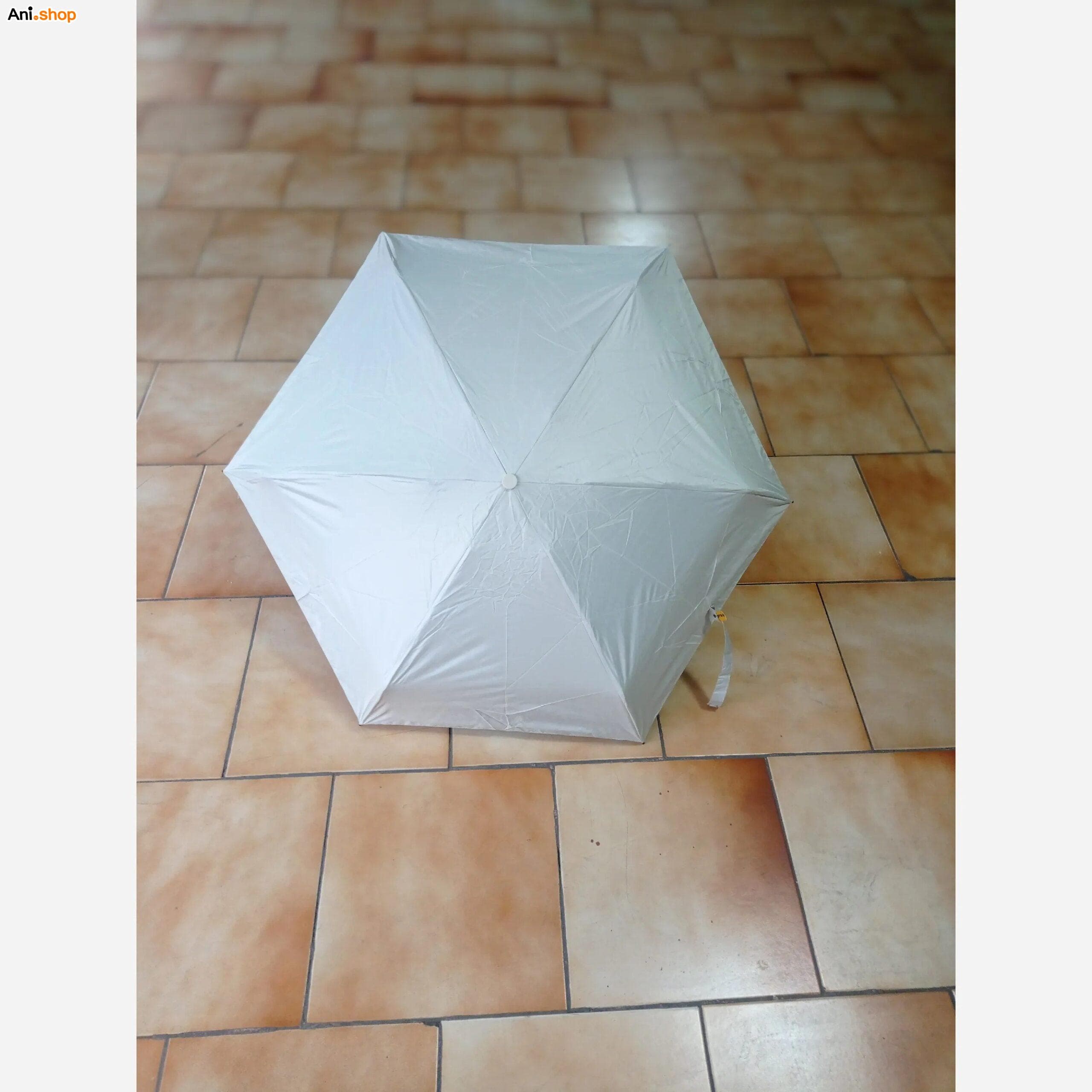 چتر مینی کپسولی جیبی وارداتی مدل تاشو ۵ لایه ضد اشعه UV (محافظ آفتاب و باران) سفید — تصویر ۲