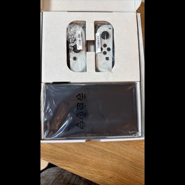 کنسول بازی نینتندو مدل nintendo switch oled فول بازی کپی خور شده همراه کارت حافظه 256 گیگابایت (آنباکس) — تصویر ۲