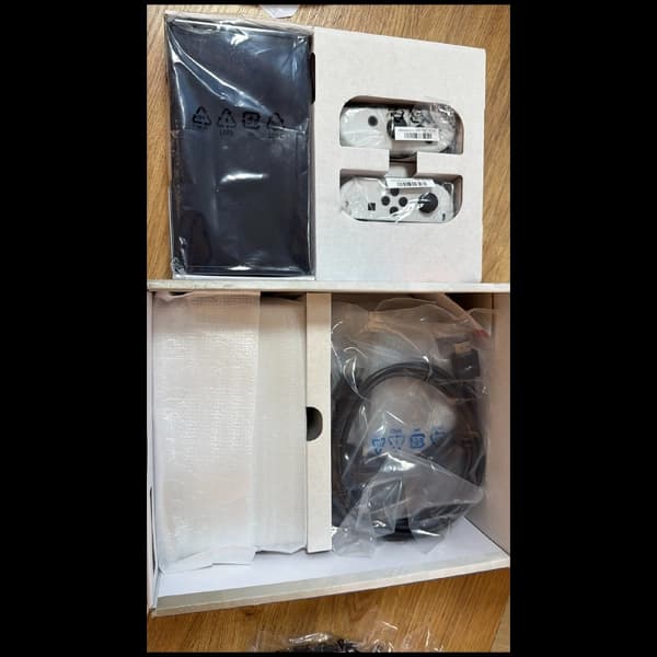 کنسول بازی نینتندو مدل nintendo switch oled فول بازی کپی خور شده همراه کارت حافظه 256 گیگابایت (آنباکس) — تصویر ۴