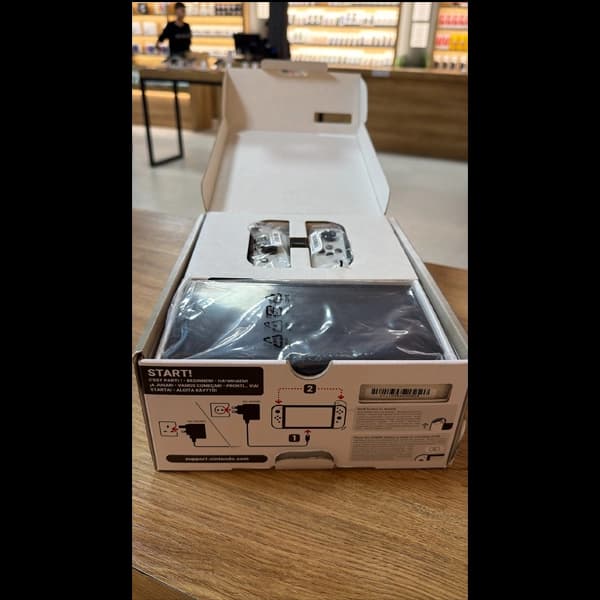 کنسول بازی نینتندو مدل nintendo switch oled فول بازی کپی خور شده همراه کارت حافظه 256 گیگابایت (آنباکس) — تصویر ۳