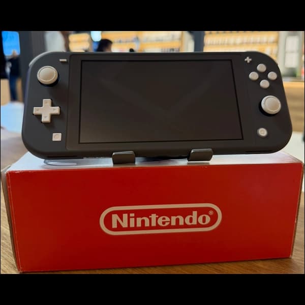 کنسول بازی نینتندو مدل Switch Lite کپی خور شده همراه با کارت حافظه 256 گیگابایت فول بازی (آنباکس)