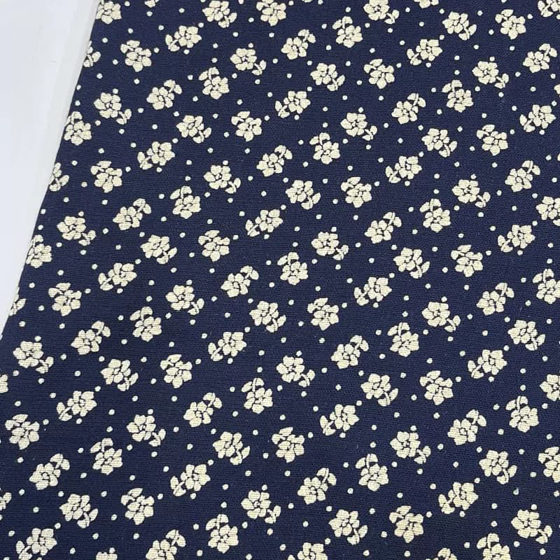 پارچه نخی طرح گلدار زمینه سورمه‌ای