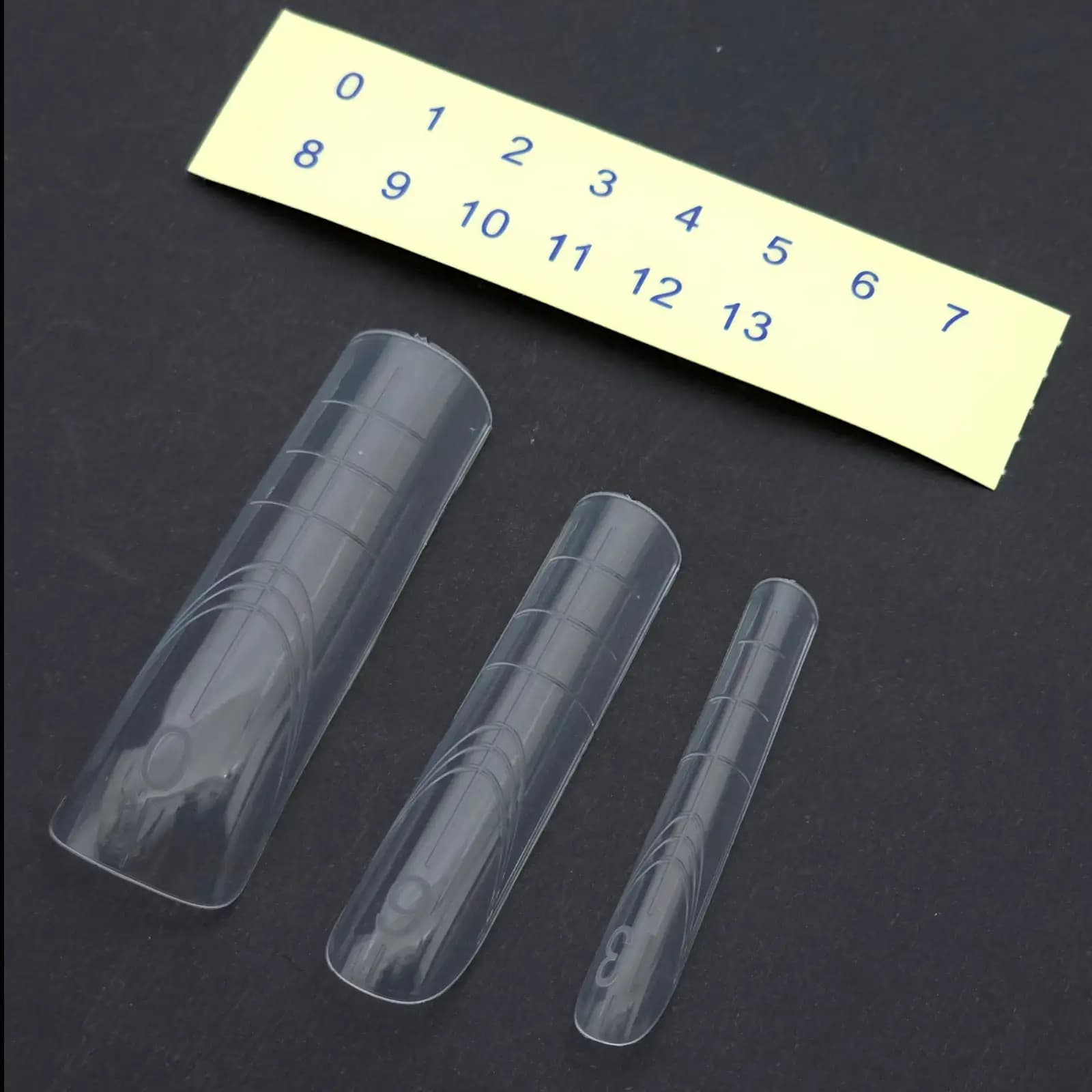 قالب کاشت ناخن مستر ژل Master Gel طرح مربع قوس‌دار(Arched Square) بسته ۱۴۰ عددی | تیپ دوال فرم شفاف پلی ژل و ژلیکس سایزبندی ۰ تا ۱۳ — تصویر ۲